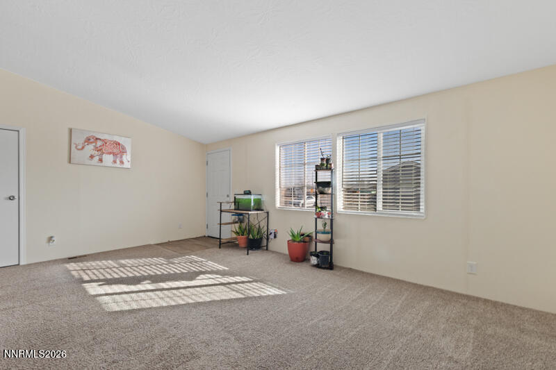 2575 Tonopah Street Silver Springs, NV 89429 - Photo 5 of 22 a view of livingroom with furniture and window