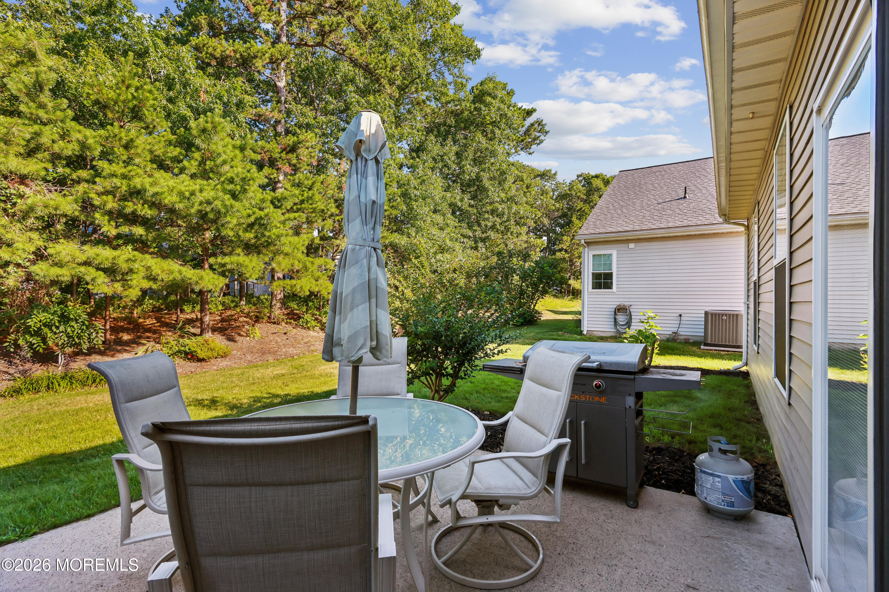 66 Sandpiper Road Barnegat, NJ 08005 - Photo 23 of 25 a view of a patio in backyard