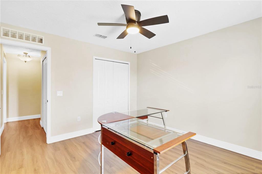 1705 Ridgemoor Drive Mascotte, FL 34753 - Photo 33 of 53 a room with table and ceiling fan
