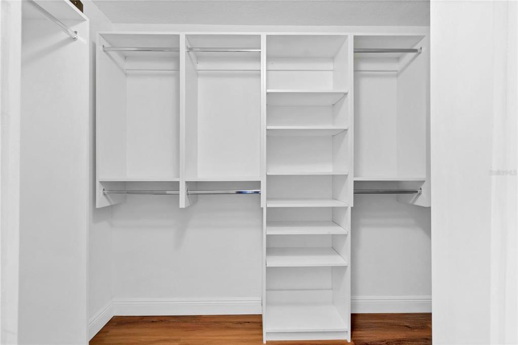 1705 Ridgemoor Drive Mascotte, FL 34753 - Photo 37 of 53 a view of walk in closet with empty racks