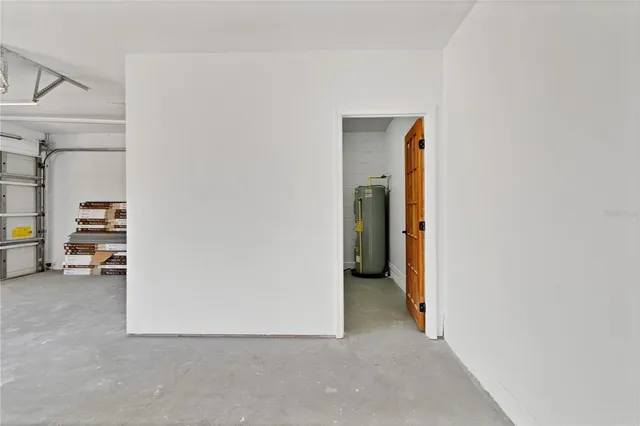 an aerial view of residential house with pool