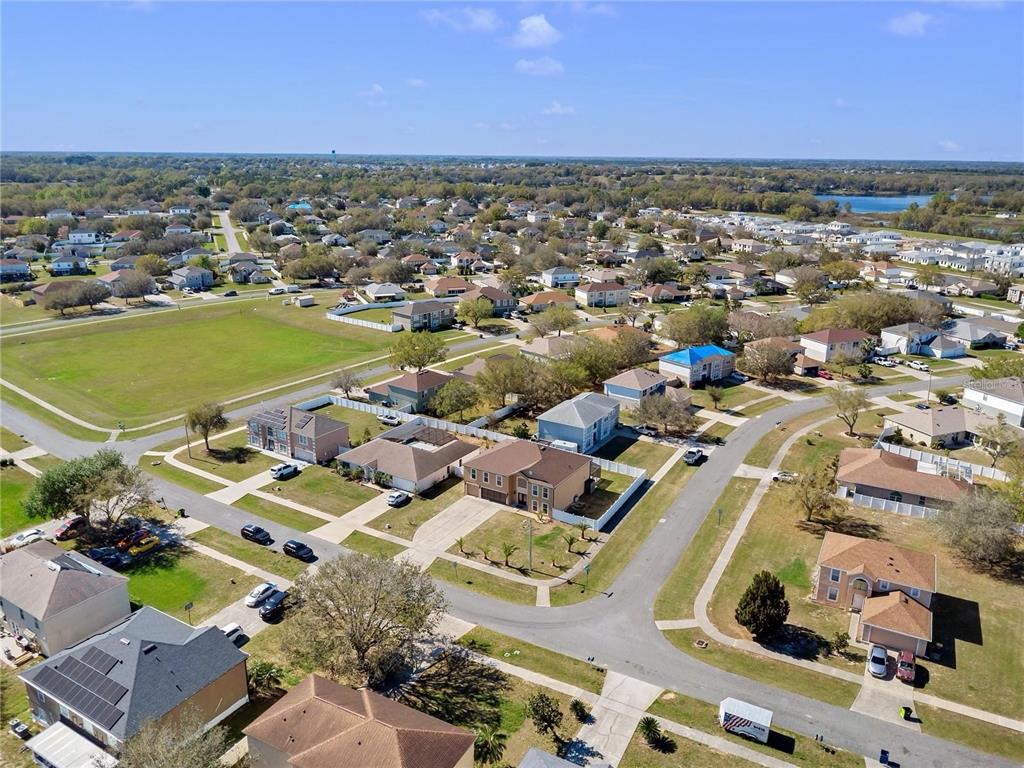1705 Ridgemoor Drive Mascotte, FL 34753 - Photo 53 of 53 an aerial view of residential houses with outdoor space