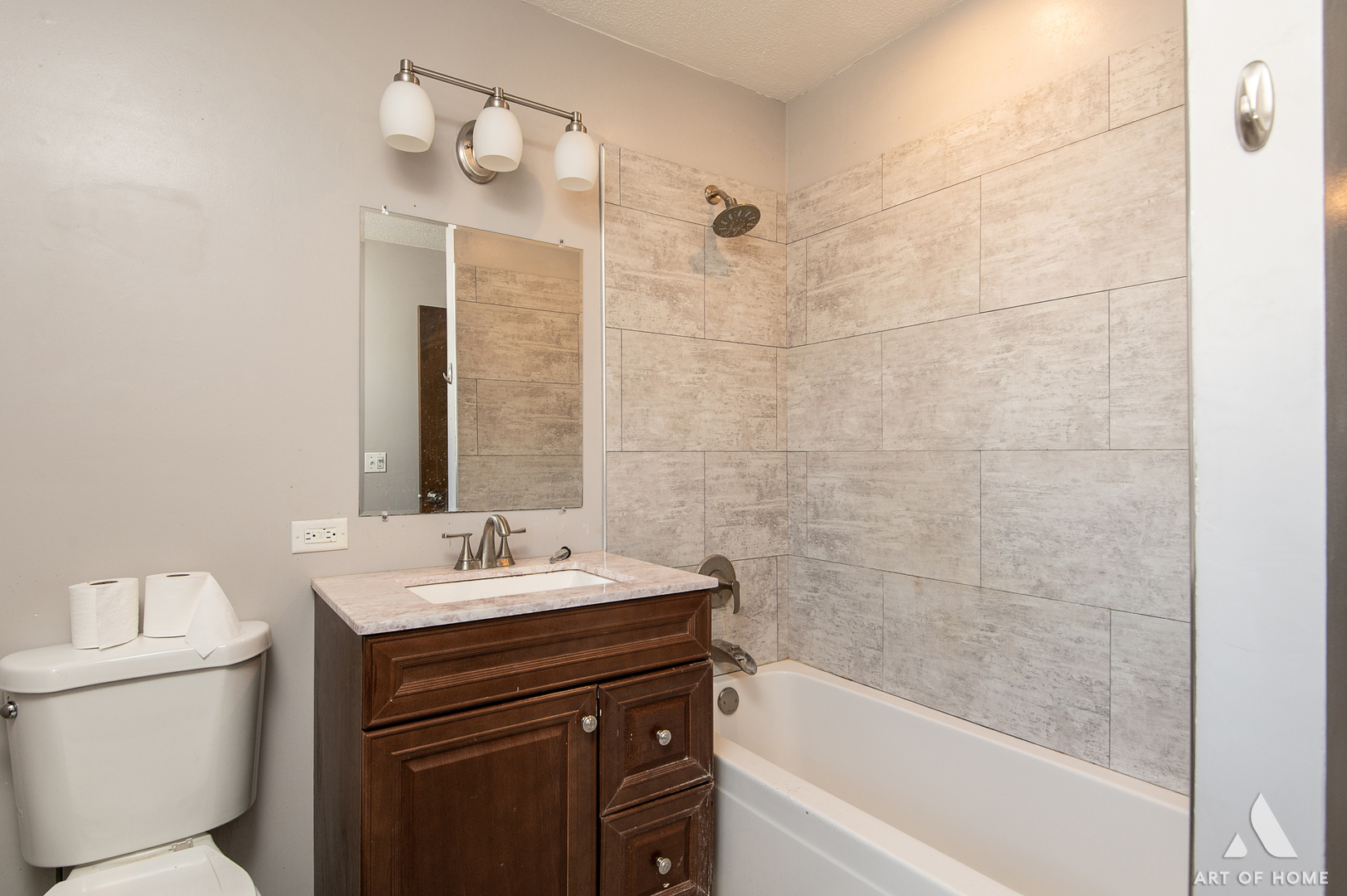 3034 190th Street Lansing, IL 60438 - Photo 7 of 25 a bathroom with a sink a toilet and shower