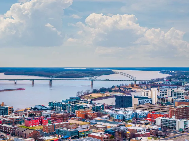 an aerial view of a swimming pool with seating area