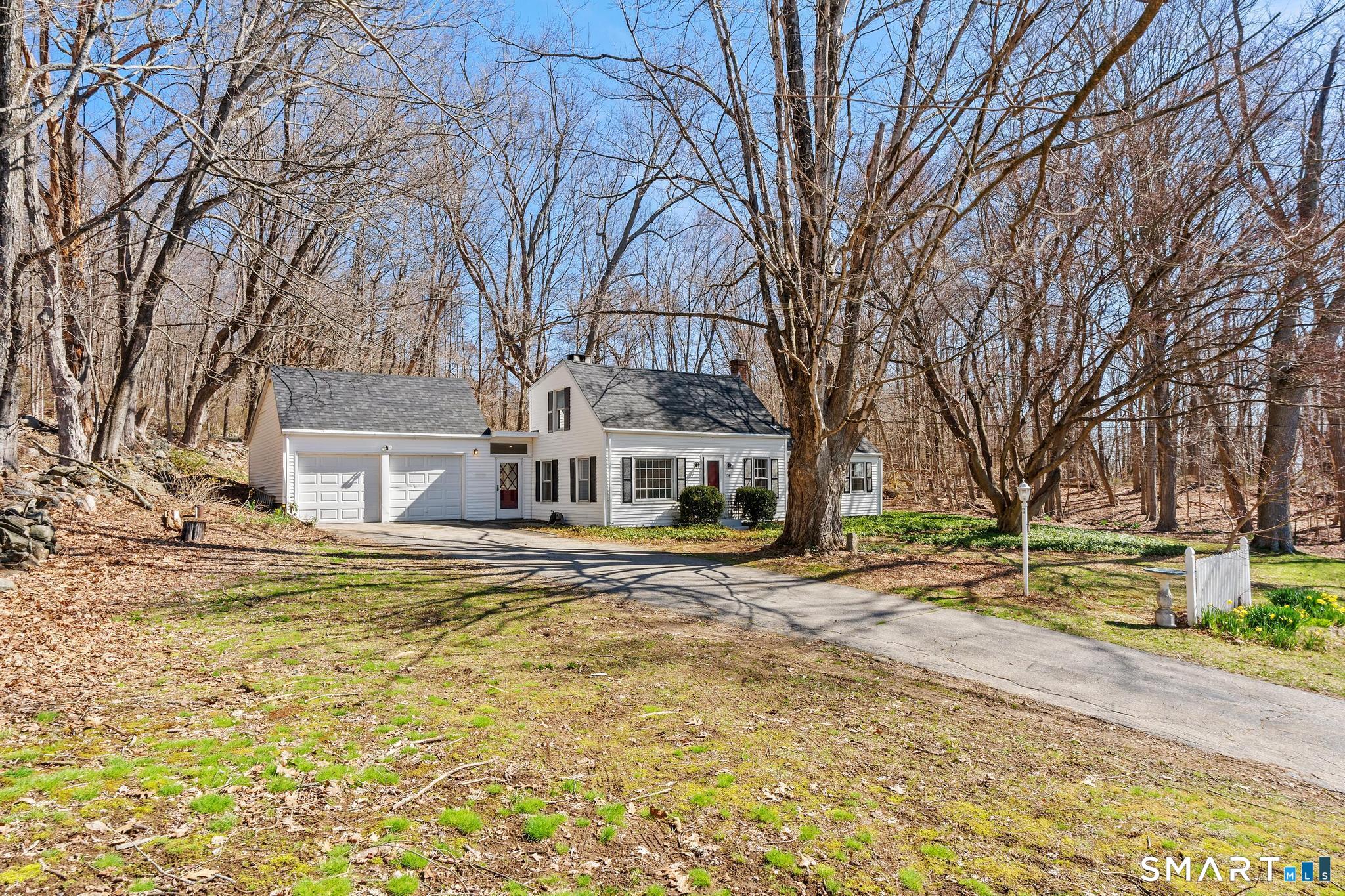 128 Machine Shop Hill Road Windham, CT 06266 - Photo 18 of 45 a house that has a tree in front of it