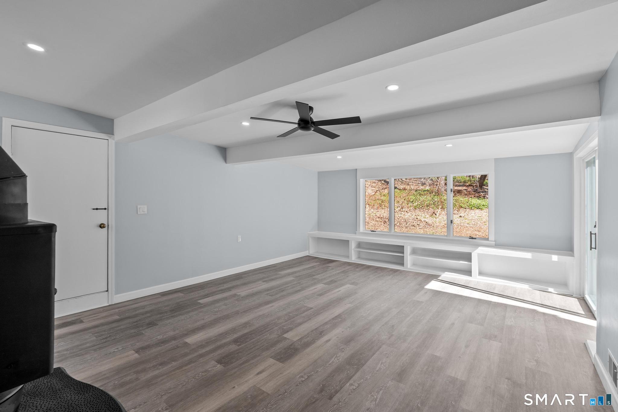 128 Machine Shop Hill Road Windham, CT 06266 - Photo 20 of 45 wooden floor in an empty room with a window
