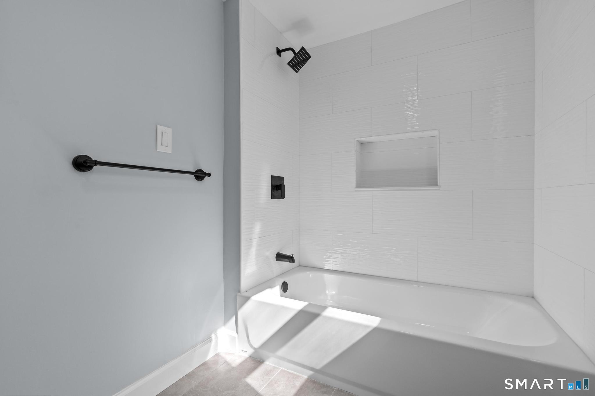 128 Machine Shop Hill Road Windham, CT 06266 - Photo 27 of 45 a bathroom with a bathtub