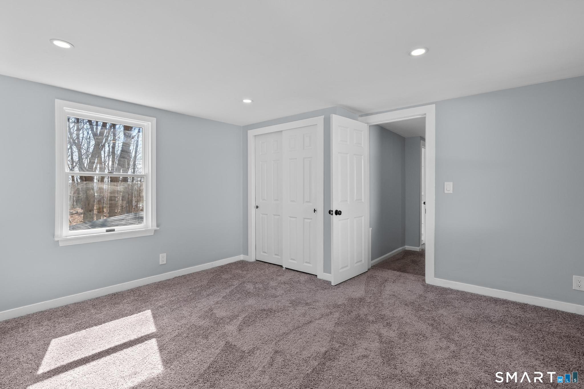 128 Machine Shop Hill Road Windham, CT 06266 - Photo 34 of 45 a view of an empty room with a window