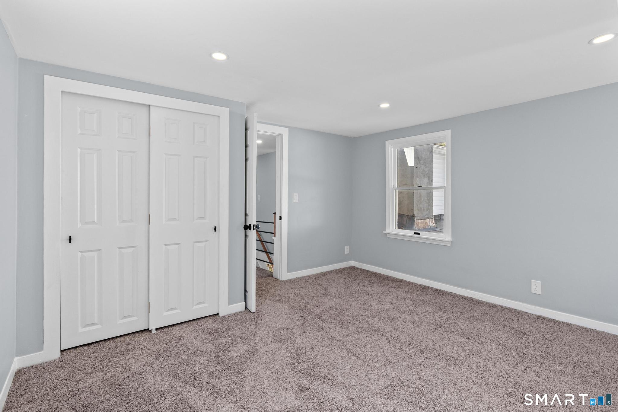 128 Machine Shop Hill Road Windham, CT 06266 - Photo 37 of 45 a view of an empty room with a window