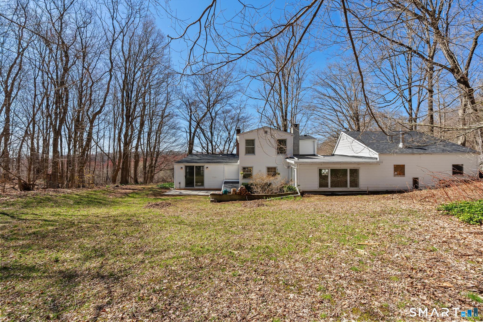 128 Machine Shop Hill Road Windham, CT 06266 - Photo 38 of 45 a house that has a tree in front of it