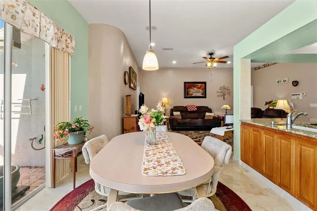 a living room with furniture fireplace and flat screen tv