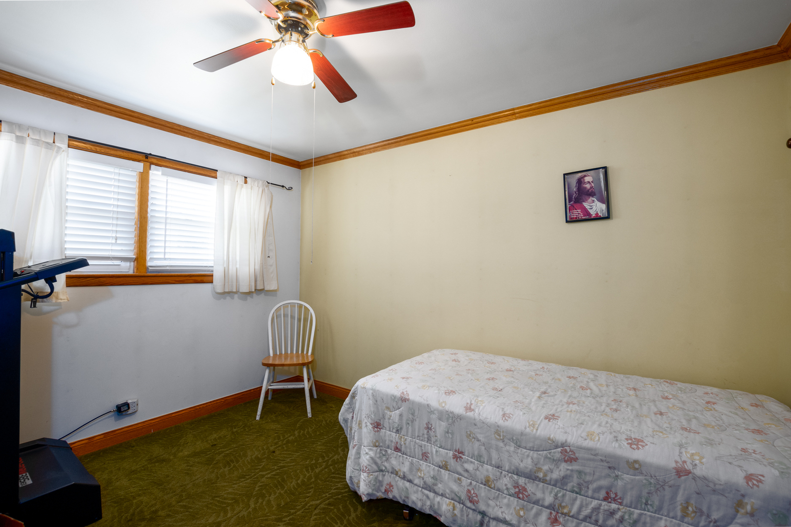 5328 South Harding Avenue Chicago, IL 60632 - Photo 12 of 26 a bedroom with a bed and a window