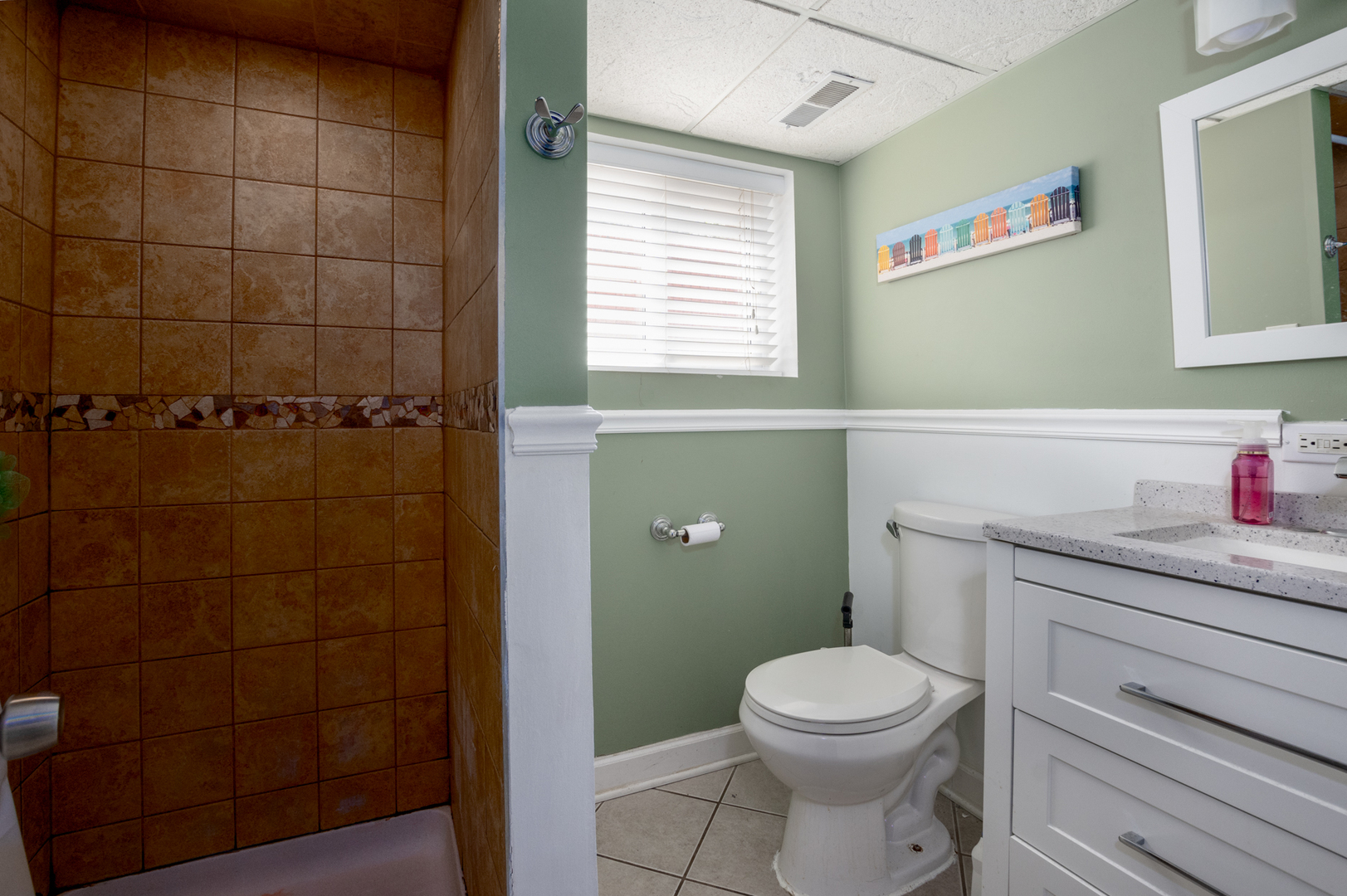 5328 South Harding Avenue Chicago, IL 60632 - Photo 17 of 26 a bathroom with a granite countertop toilet a sink and a shower