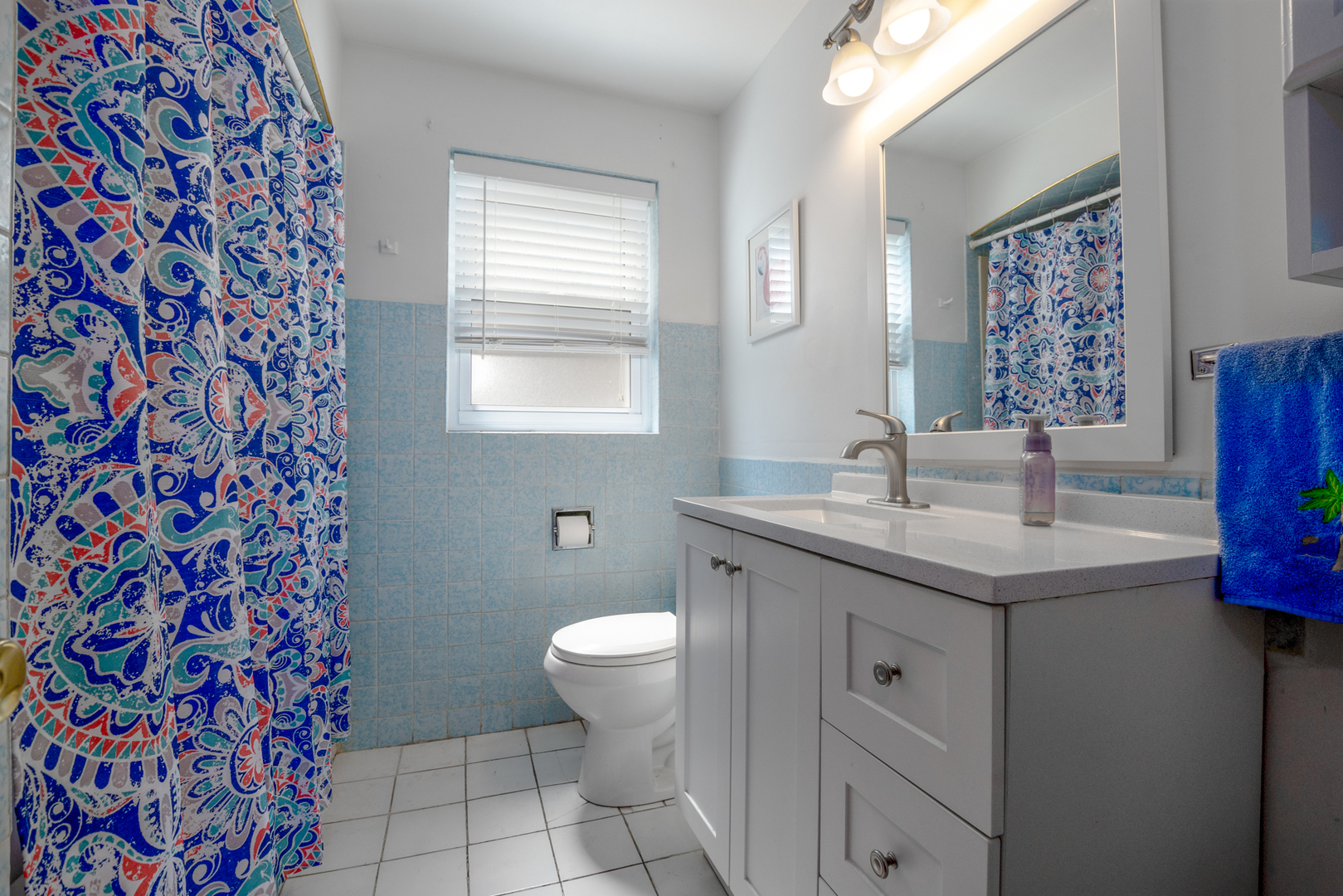5328 South Harding Avenue Chicago, IL 60632 - Photo 8 of 26 a bathroom with a granite countertop sink toilet and mirror