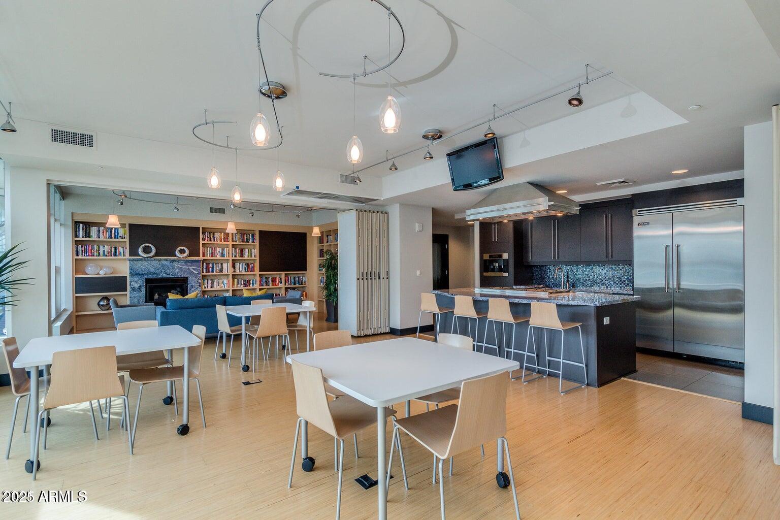 140 East Rio Salado Parkway, Unit 509 Tempe, AZ 85281 - Photo 34 of 43 a large kitchen with a table and chairs