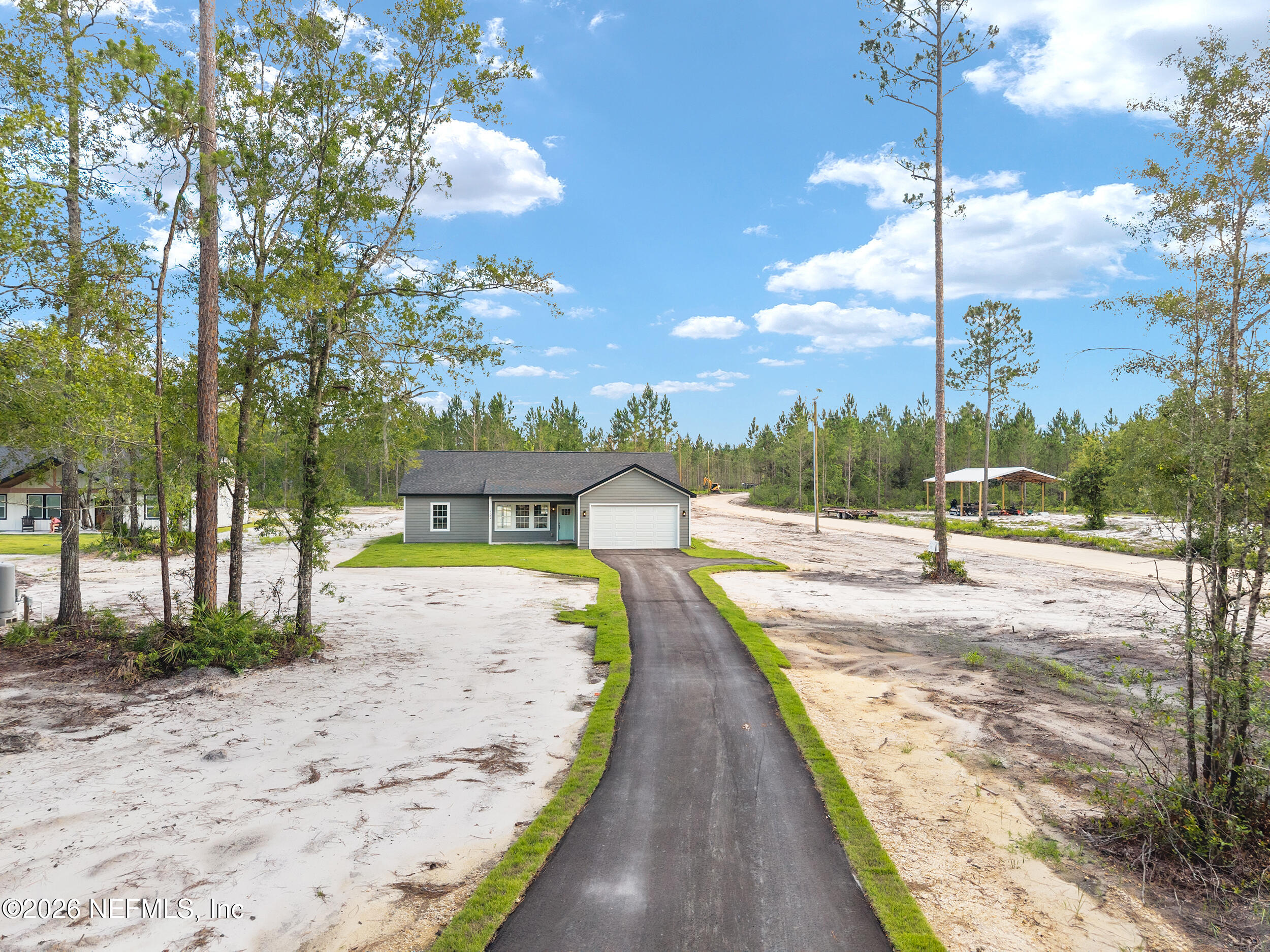 9284 Southwest Sw Cr Hampton, FL 32044 - Photo 36 of 48 DJI_20260625184229_0342_D