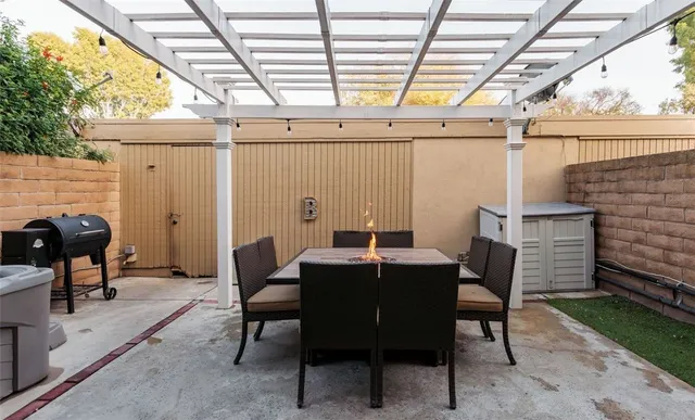 a view of a big dining room with furniture window and outside view