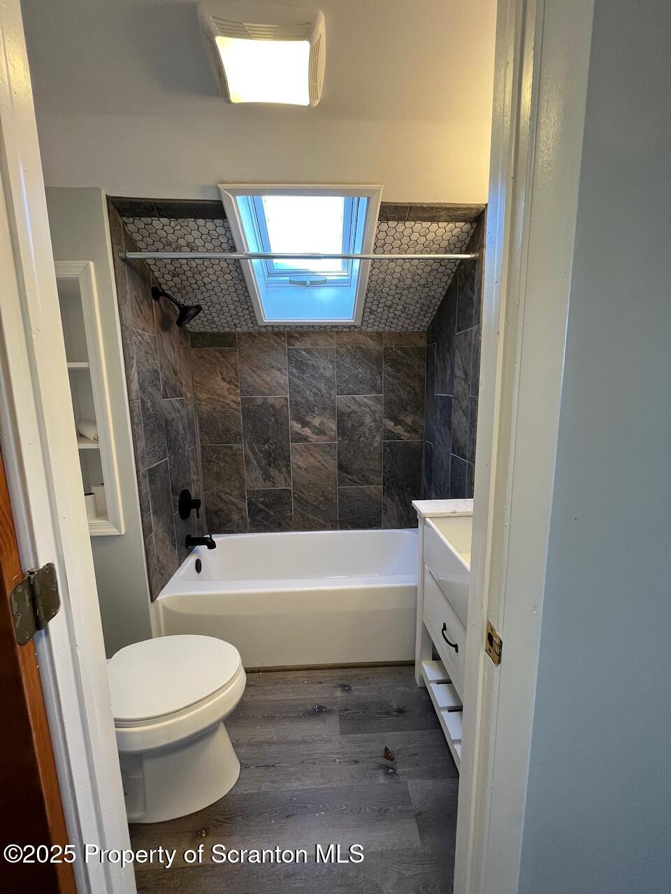 3191 Aberdeen Road Moscow, PA 18444 - Photo 11 of 14 a bathroom with a toilet and a bathtub