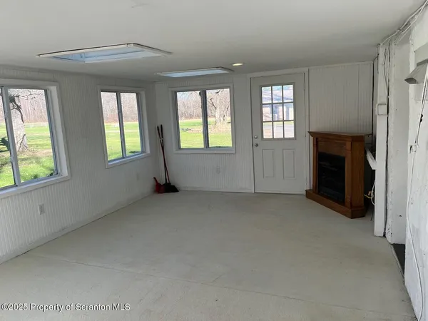 an empty room with windows
