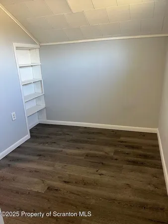 a view of room with walk in closet