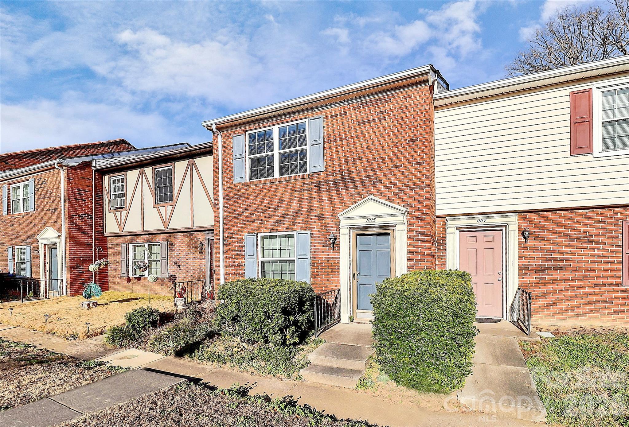 11115 Park Road Charlotte, NC 28226 - Photo 2 of 21 a front view of a house with a yard