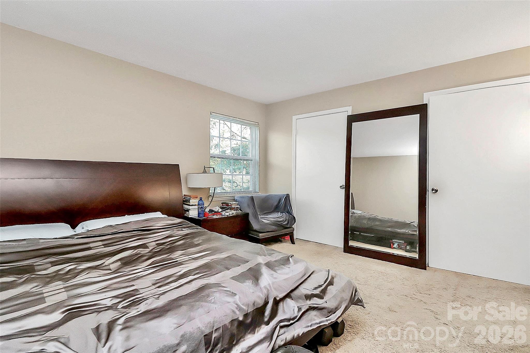 11115 Park Road Charlotte, NC 28226 - Photo 8 of 21 a bedroom with a bed and a window