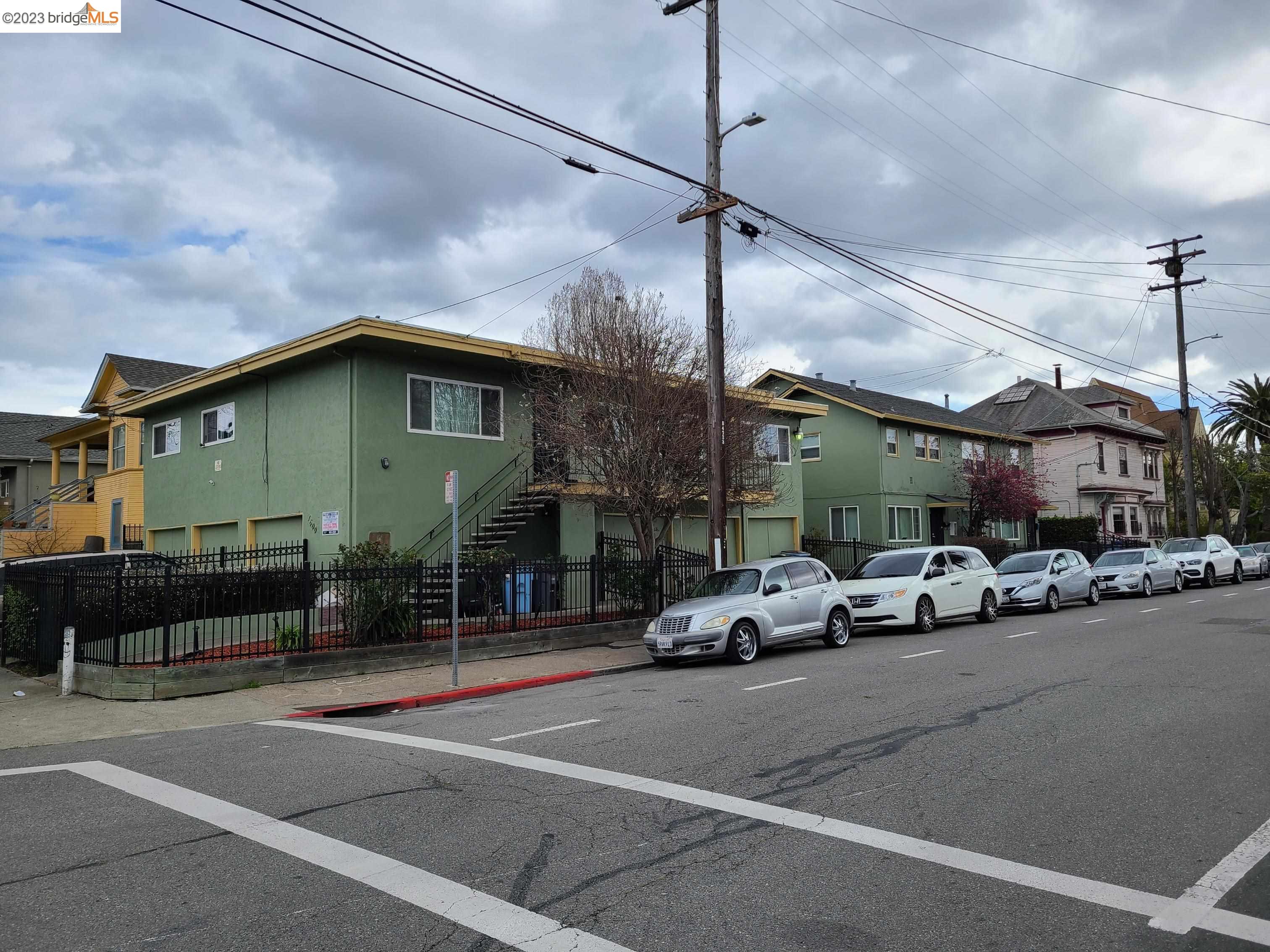 a view of a parked cars in front of a building