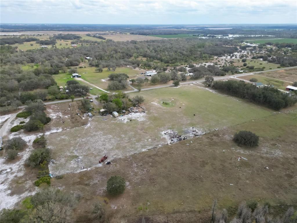 17273 Alderman Turner Road Wimauma, FL 33598 - Photo 11 of 60 an aerial view of a houses with city view