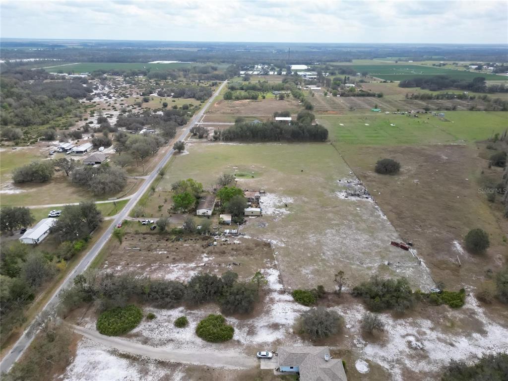 17273 Alderman Turner Road Wimauma, FL 33598 - Photo 14 of 60 a view of a lake with beach