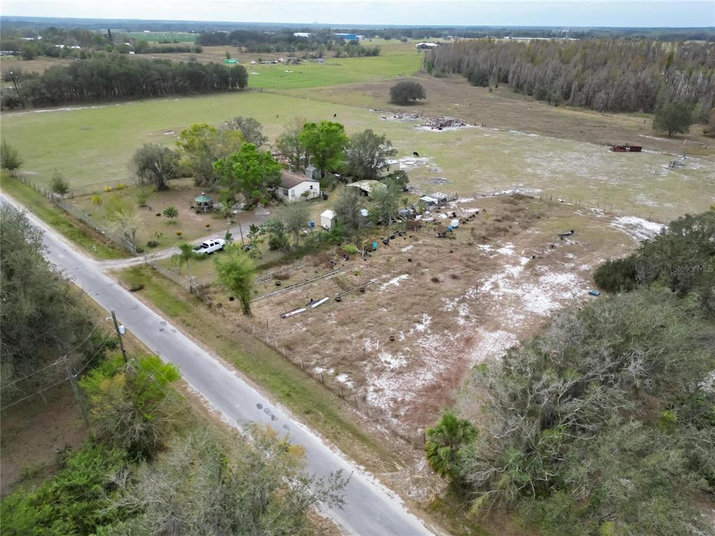 17273 Alderman Turner Road Wimauma, FL 33598 - Photo 31 of 60 a view of a lake with a mountain