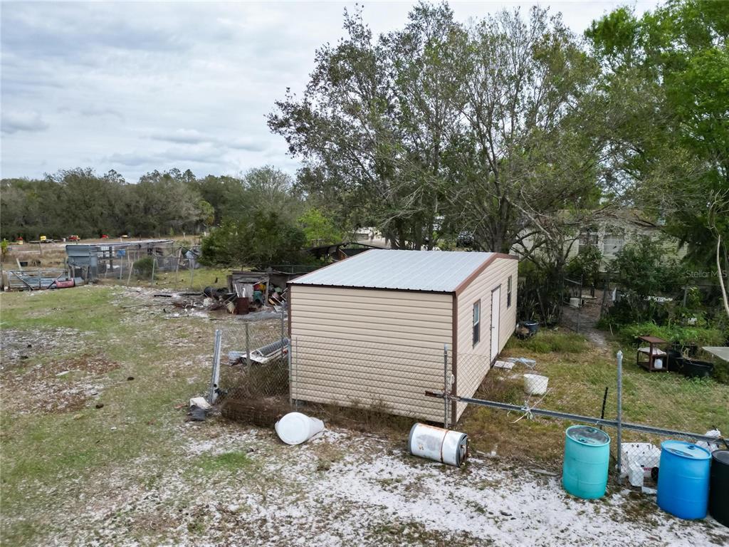 17273 Alderman Turner Road Wimauma, FL 33598 - Photo 33 of 60 a aerial view of a house with a yard