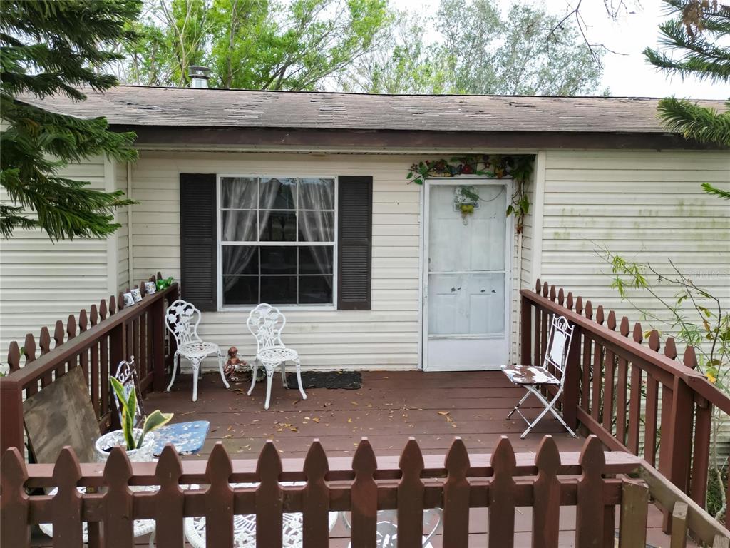 17273 Alderman Turner Road Wimauma, FL 33598 - Photo 41 of 60 a front view of a house with outdoor seating
