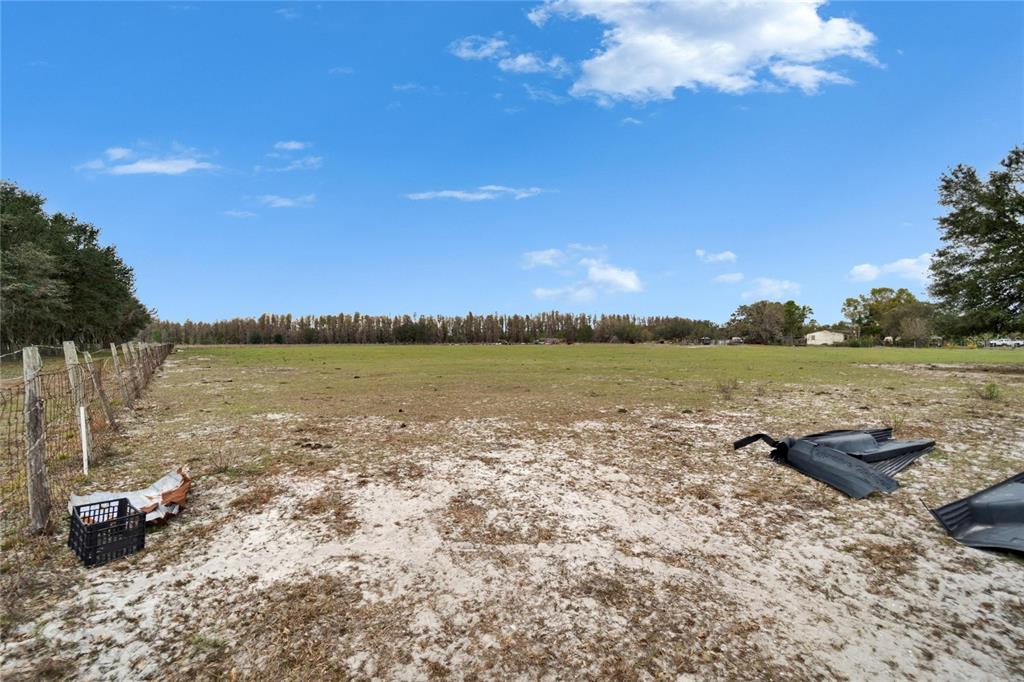 17273 Alderman Turner Road Wimauma, FL 33598 - Photo 58 of 60 a view of lake with mountain in the background