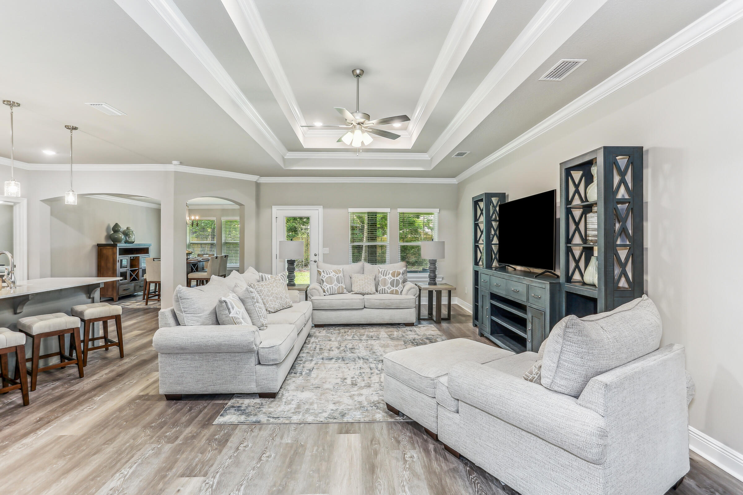 4851 Horace Lunsford Road Milton, FL 32570 - Photo 8 of 38 a living room with furniture and a flat screen tv