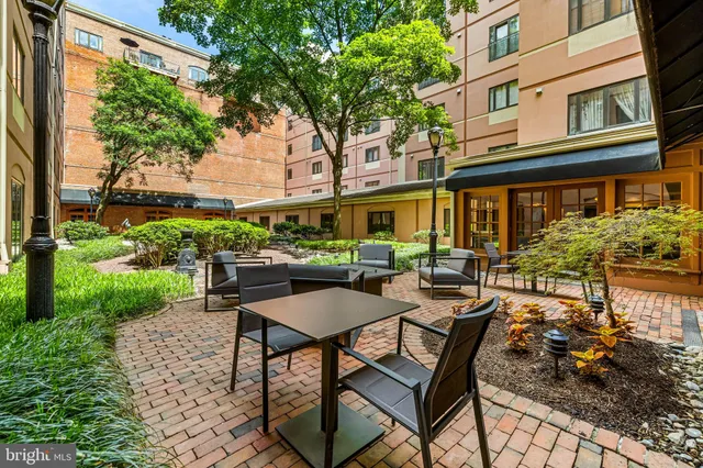 a view of a blue building with a large window