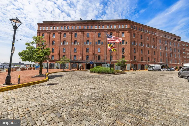 a view of a building with a street