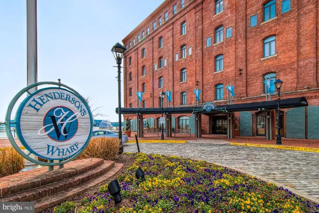 a view of water with boats and trees
