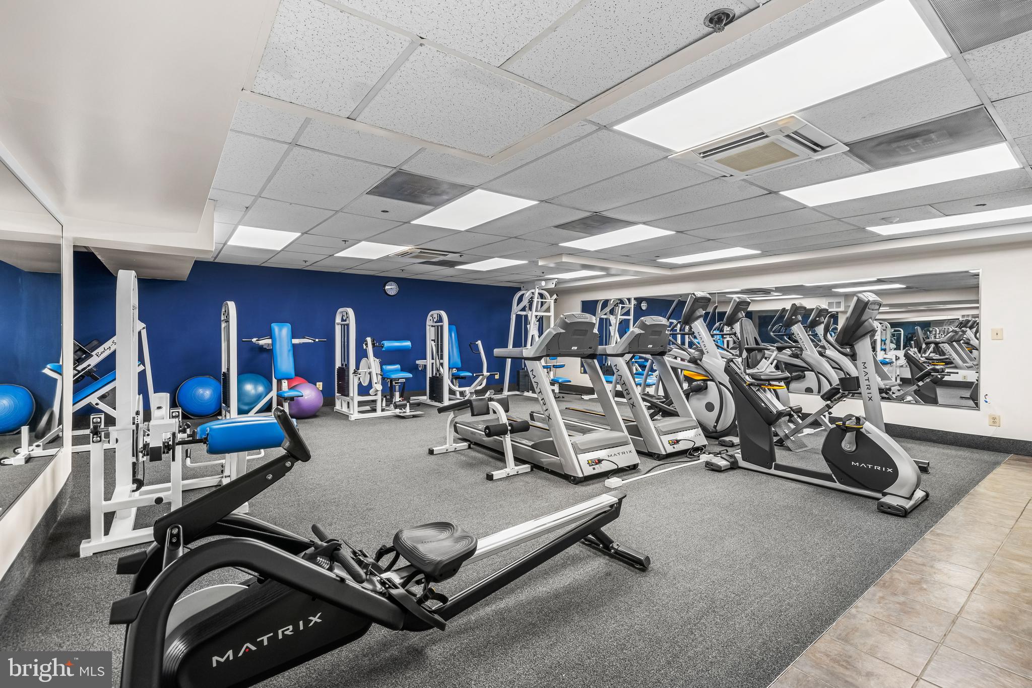 1000 Fell Street, Unit 421 Baltimore, MD 21231 - Photo 8 of 32 a view of a room with gym equipment
