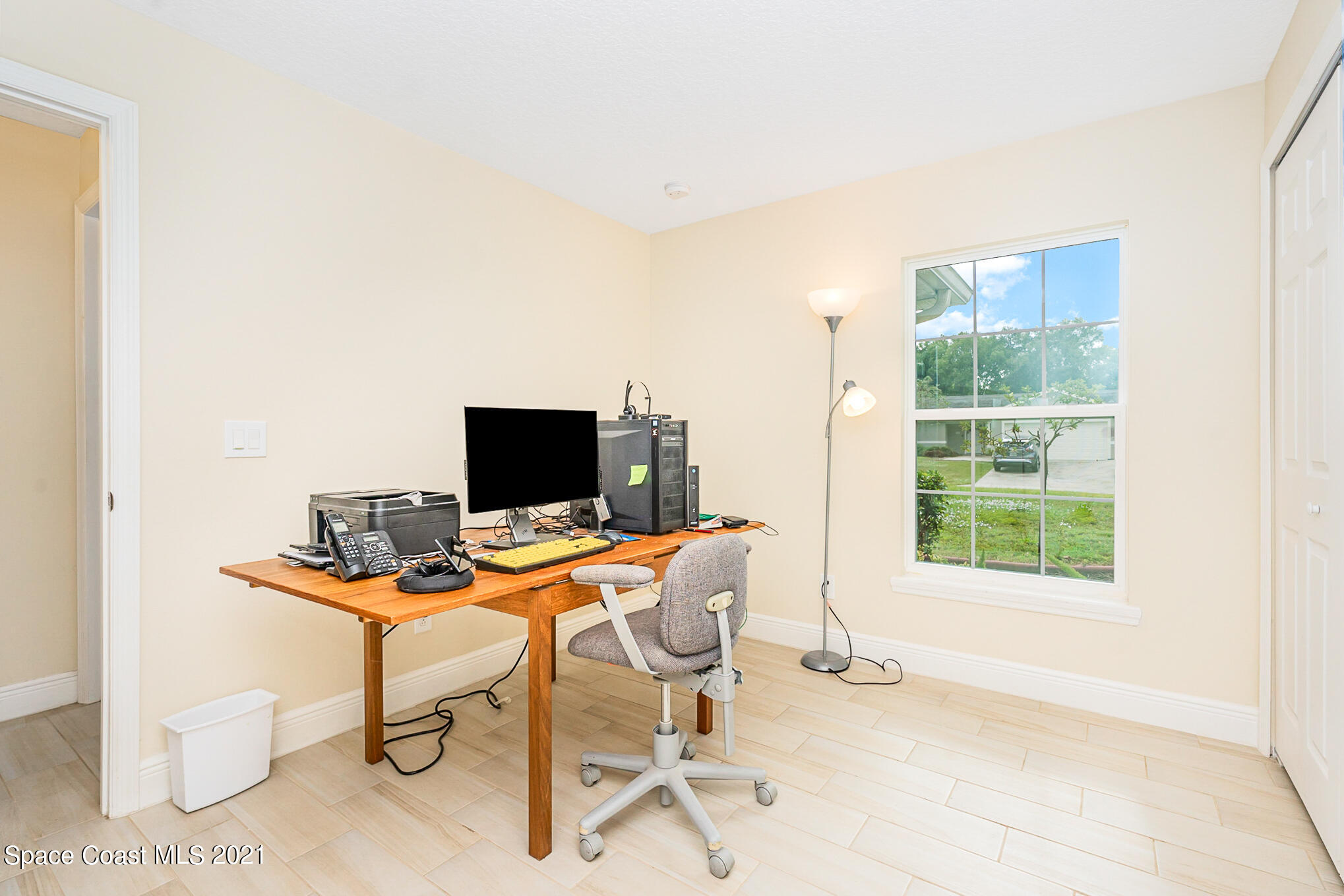 5576 Flint Road Cocoa, FL 32927 - Photo 21 of 31 a workspace with furniture and a window