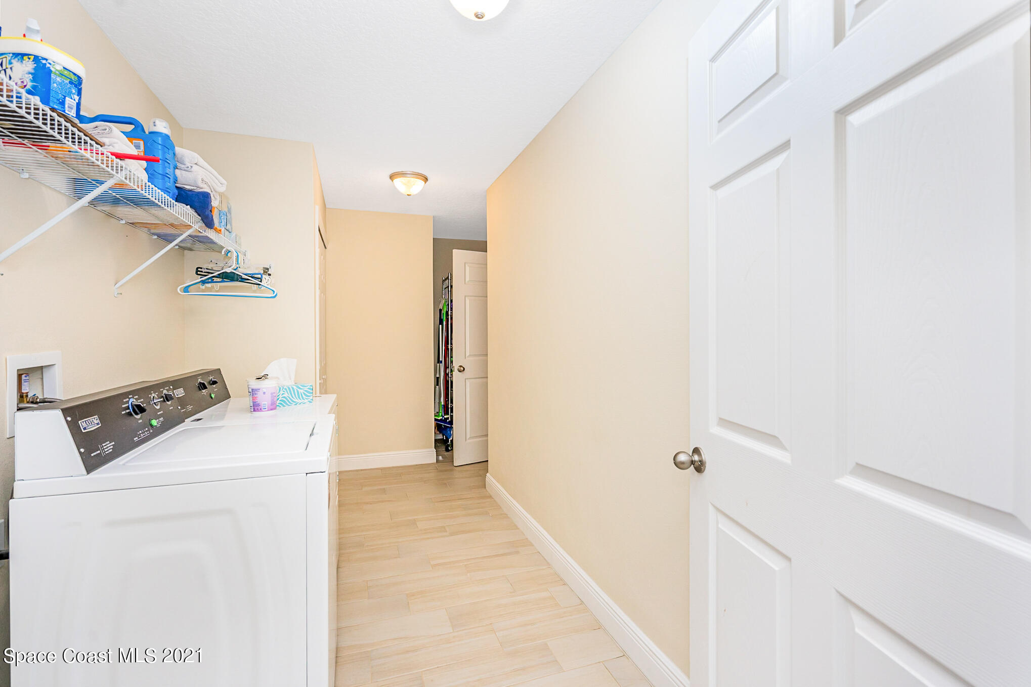 5576 Flint Road Cocoa, FL 32927 - Photo 24 of 31 a room with storage and utility
