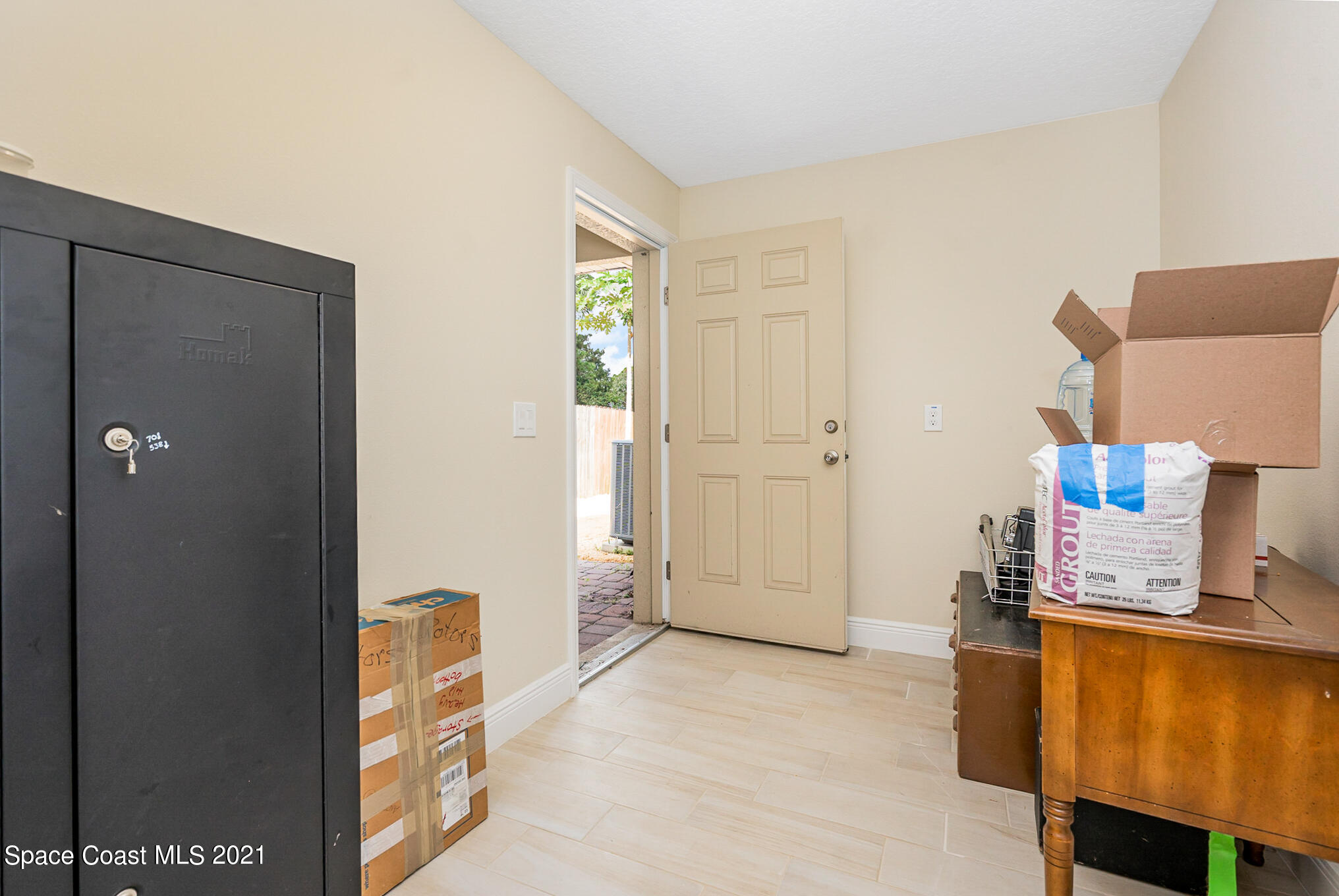 5576 Flint Road Cocoa, FL 32927 - Photo 25 of 31 a view of kitchen and utility room
