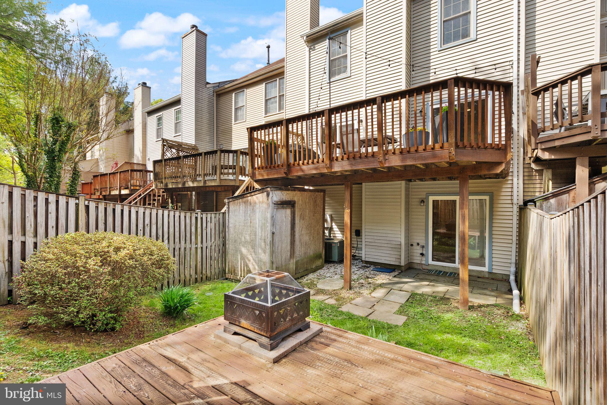 6369 English Ivy Way Springfield, VA 22152 - Photo 56 of 62 a view of a house with backyard and sitting area