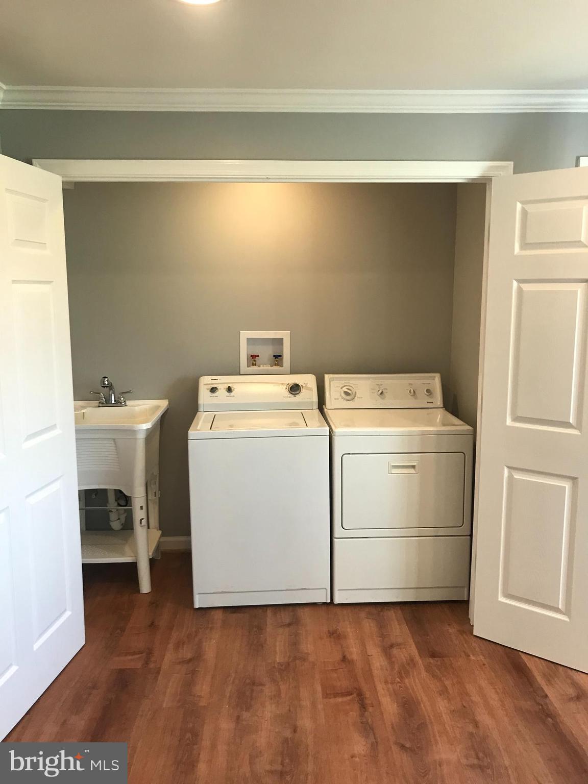18600 Jerusalem Church Road Poolesville, MD 20837 - Photo 12 of 12 a utility room with dryer and washer