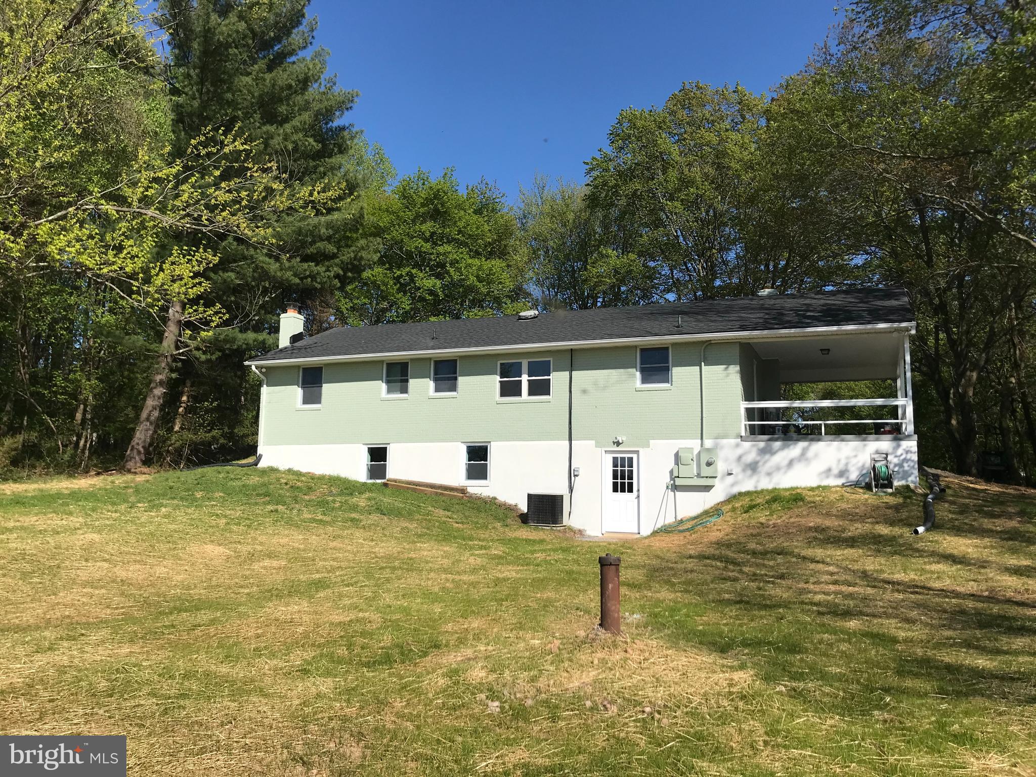 18600 Jerusalem Church Road Poolesville, MD 20837 - Photo 2 of 12 a view of a house with a patio