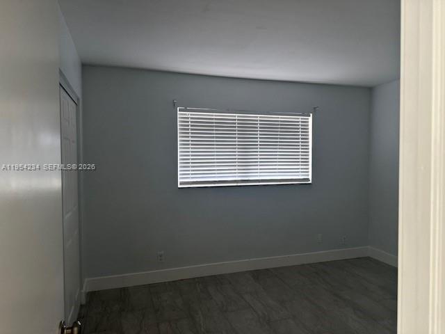 3905 North Nob Hill Road, Unit 304 Sunrise, FL 33351 - Photo 6 of 17 an empty room with a window