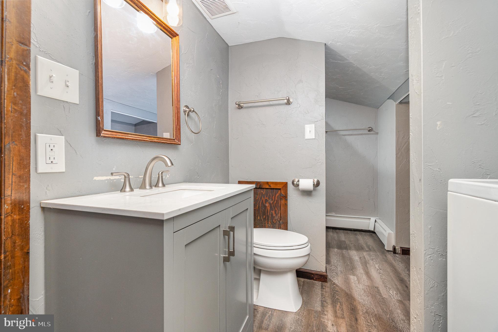 31 East Water Street Gettysburg, PA 17325 - Photo 21 of 26 a bathroom with a sink toilet and shower