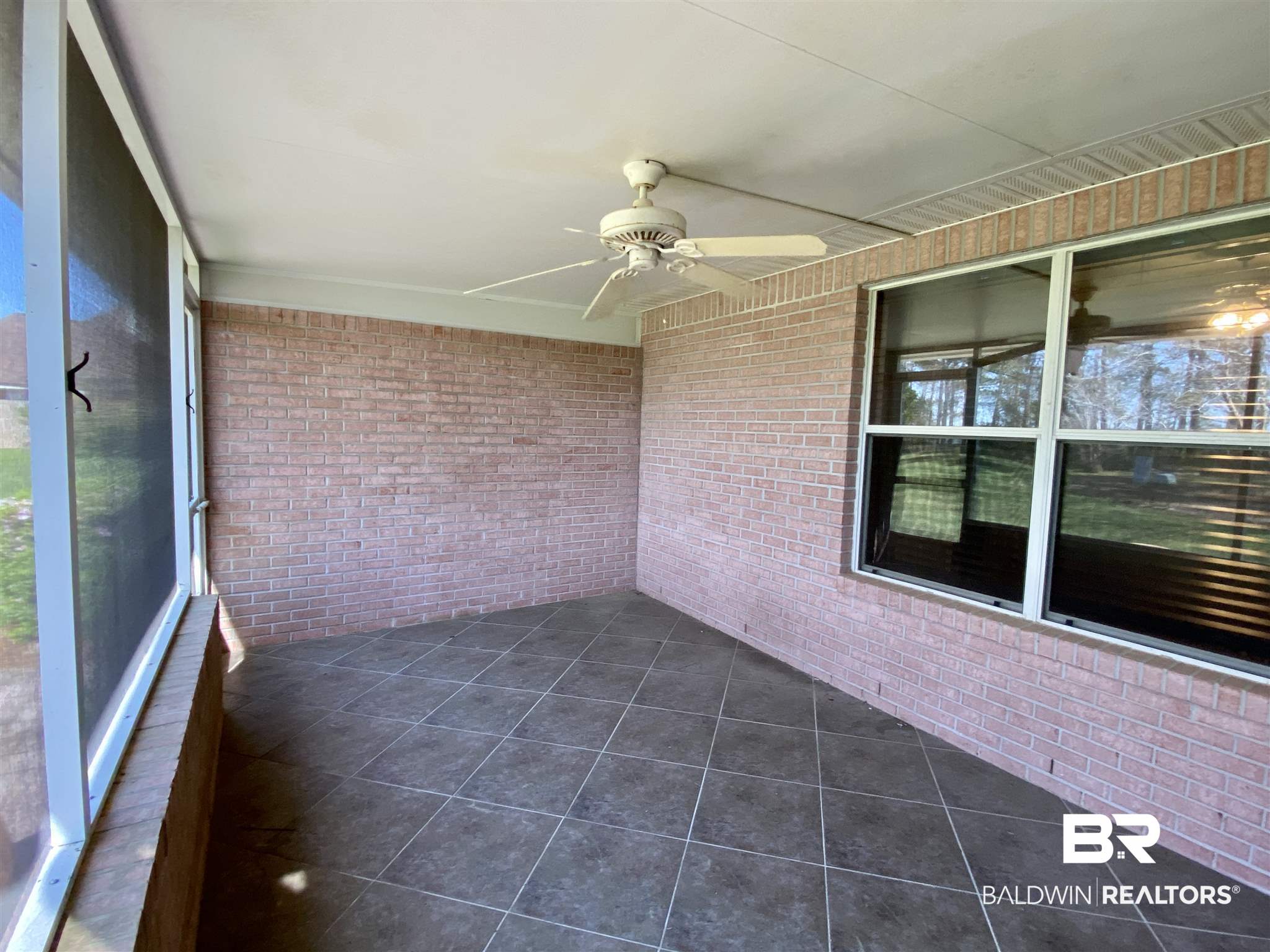 9619 Villas Drive Foley, AL 36535 - Photo 27 of 31 Screened Porch