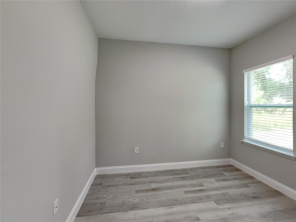 11604 North Kenlake Circle Citrus Springs, FL 34434 - Photo 12 of 15 a view of an empty room and window