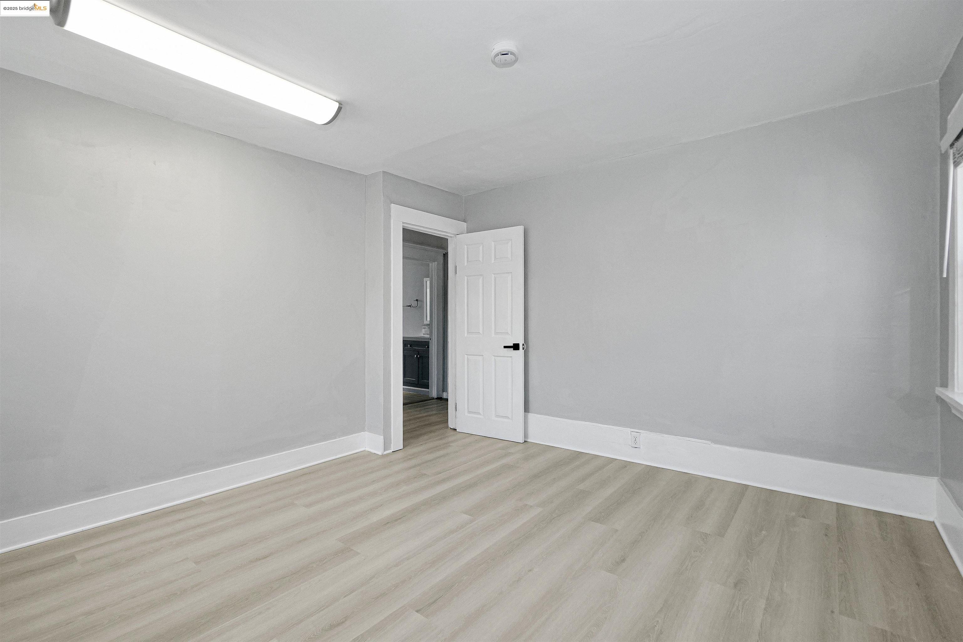 2207 East 19th Street Oakland, CA 94606 - Photo 15 of 30 a view of an empty room