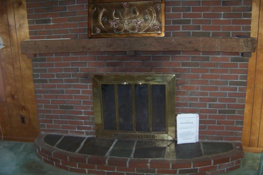 36 Ridgeway Avenue Sanford, ME 04073 - Photo 12 of 33 Gas fireplace w/ brick hearth